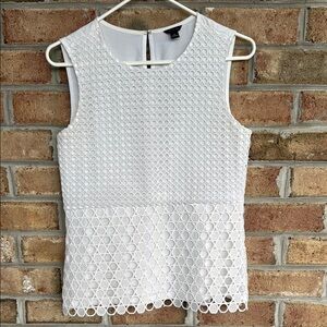 Ann Taylor white top with circle cutouts/overlay lace. Size small